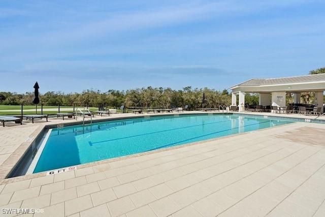 pool featuring a patio area