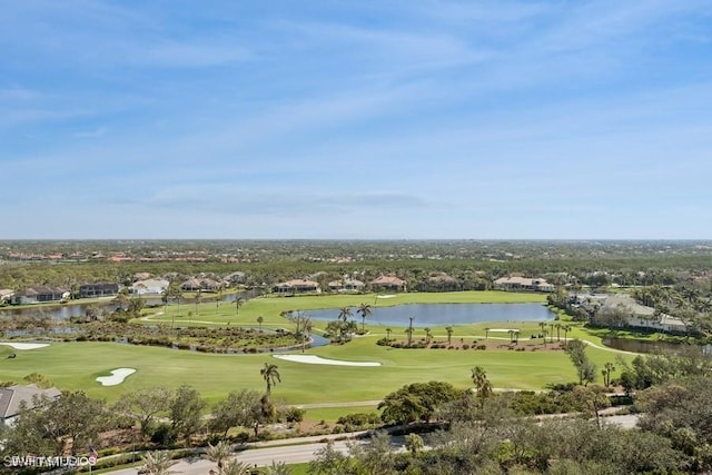 birds eye view of property featuring a water view and golf course view