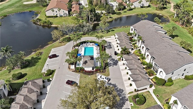 bird's eye view with a water view and a residential view