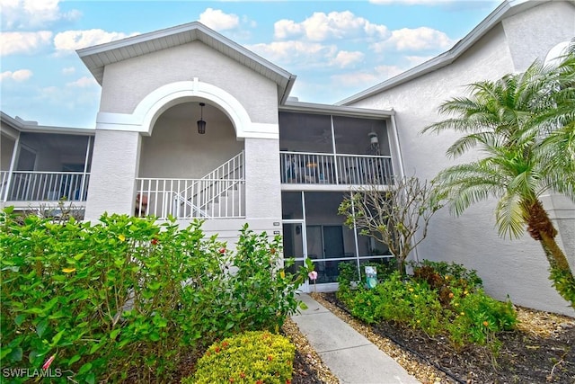 view of property with stairs