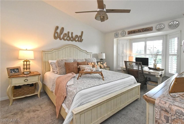 bedroom featuring a ceiling fan, carpet flooring, and vaulted ceiling