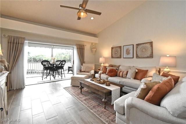 living area with high vaulted ceiling, a ceiling fan, and recessed lighting