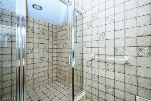 full bathroom with a stall shower