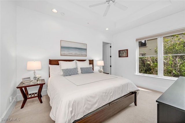 bedroom with light carpet, baseboards, a ceiling fan, and recessed lighting