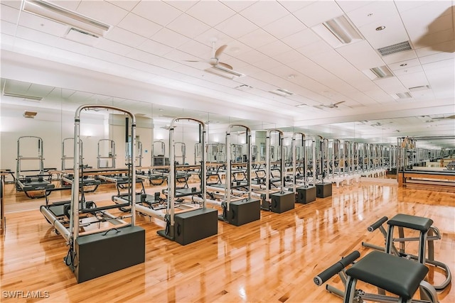 gym featuring wood finished floors