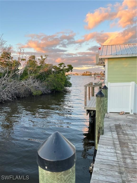 view of dock with a water view