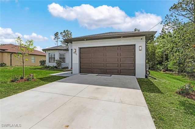 view of front of house with a garage, a front yard, driveway, and stucco siding