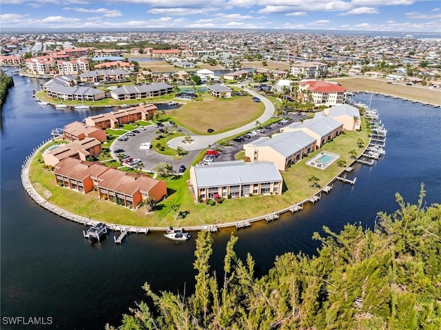 aerial view with a water view and a residential view