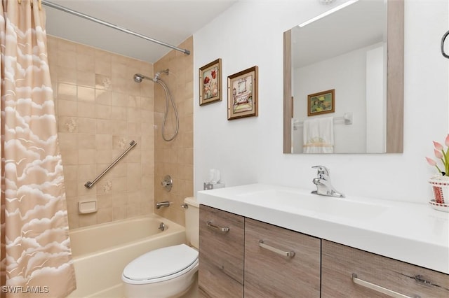 full bath featuring toilet, shower / tub combo with curtain, and vanity