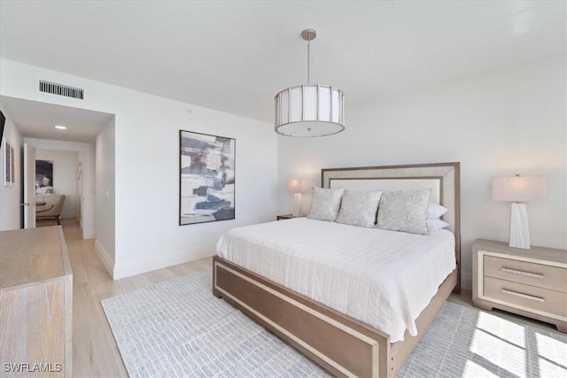 980 Cape Marco Dr Unit 805, Marco Island, FL 34145 - bedroom with baseboards and light wood-style flooring