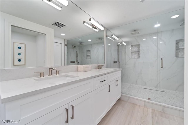 980 Cape Marco Dr Unit 805, Marco Island, FL 34145 - bathroom featuring a marble finish shower, recessed lighting, and double vanity