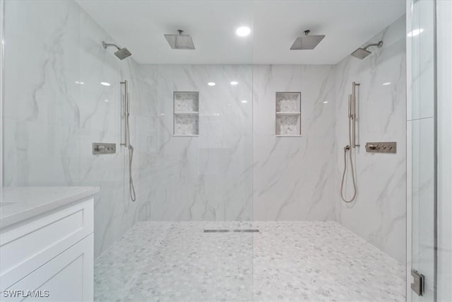 980 Cape Marco Dr Unit 805, Marco Island, FL 34145 - bathroom featuring a marble finish shower and vanity