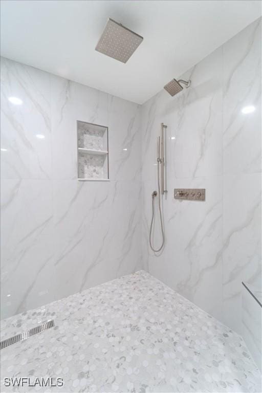 980 Cape Marco Dr Unit 805, Marco Island, FL 34145 - bathroom with a marble finish shower