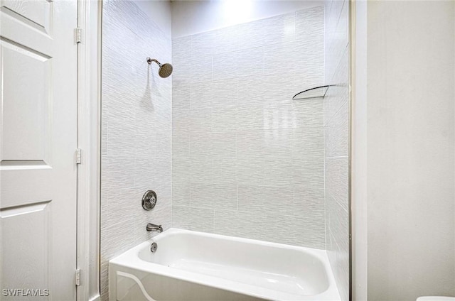 bathroom with shower / tub combination