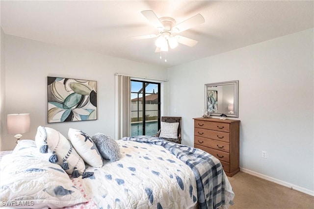 bedroom featuring light carpet, access to exterior, ceiling fan, and baseboards