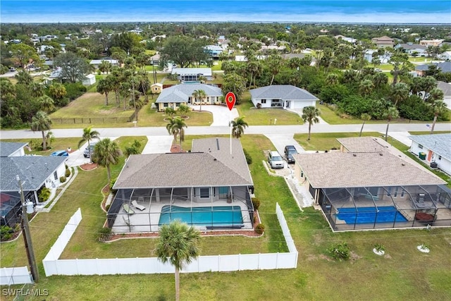 birds eye view of property with a residential view