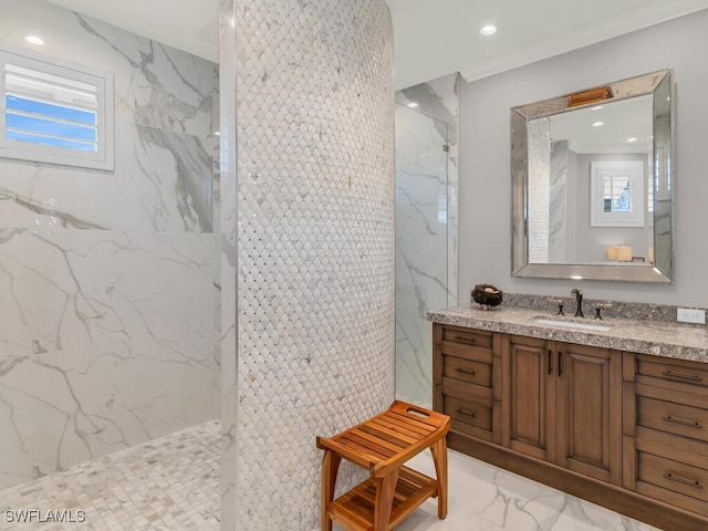 full bathroom featuring marble finish floor, a marble finish shower, vanity, and recessed lighting