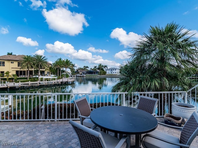 view of patio with a water view