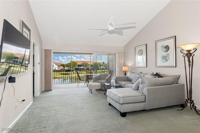 living room featuring ceiling fan, carpet floors, and high vaulted ceiling