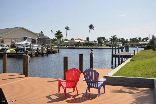 dock area featuring a water view and boat lift