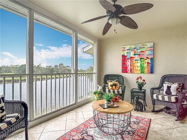 sunroom / solarium with ceiling fan