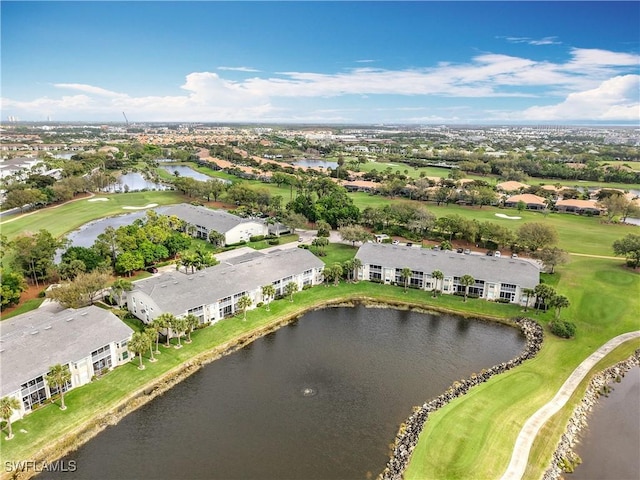 aerial view featuring golf course view and a water view