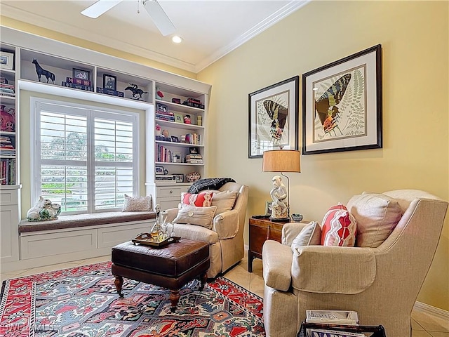 living area with ceiling fan, light tile patterned flooring, and crown molding