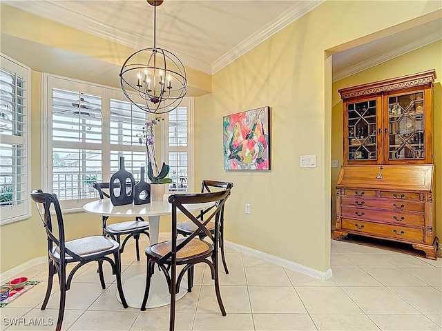 dining room with baseboards, plenty of natural light, light tile patterned flooring, and crown molding