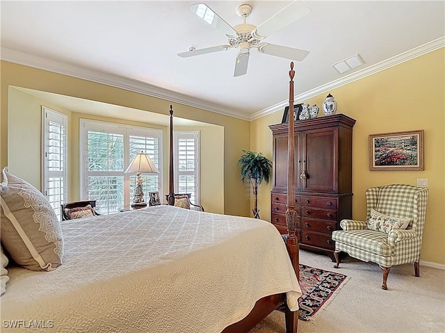 bedroom with ceiling fan, light colored carpet, visible vents, baseboards, and ornamental molding