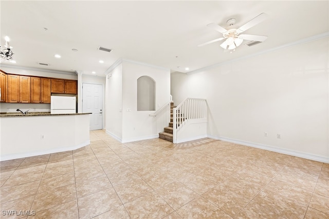 unfurnished room with recessed lighting, visible vents, baseboards, ornamental molding, and stairway