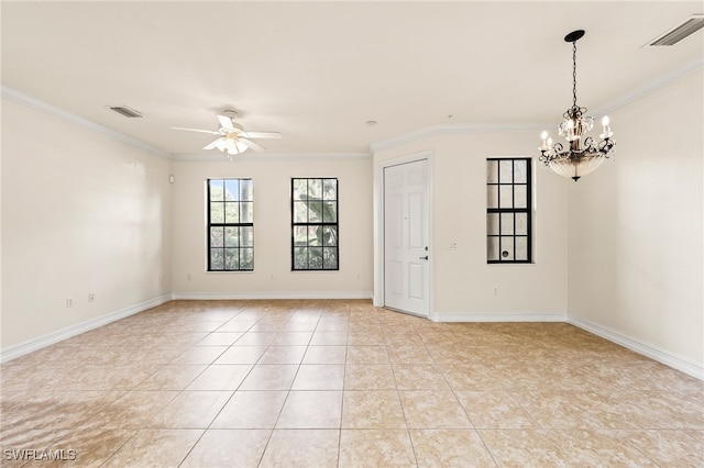 empty room with ornamental molding, visible vents, baseboards, and ceiling fan with notable chandelier