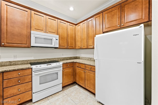 kitchen featuring white appliances, light tile patterned flooring, light stone counters, and brown cabinets