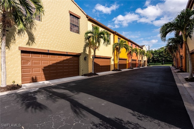 view of building exterior with a garage