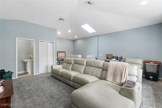 carpeted living area featuring visible vents, vaulted ceiling, and recessed lighting