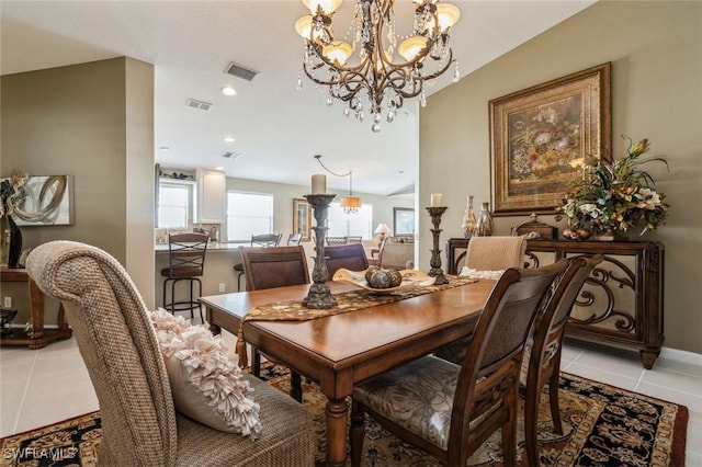 dining room with a chandelier, recessed lighting, visible vents, and light tile patterned floors