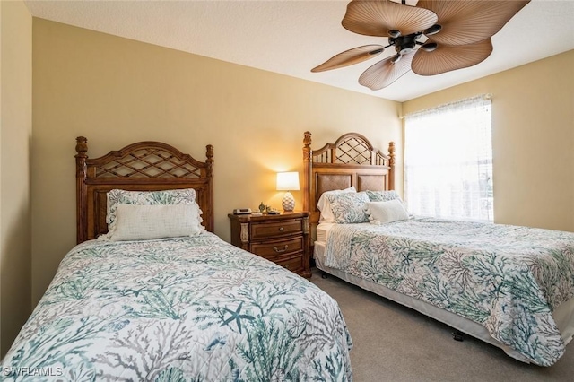 bedroom featuring carpet flooring and a ceiling fan