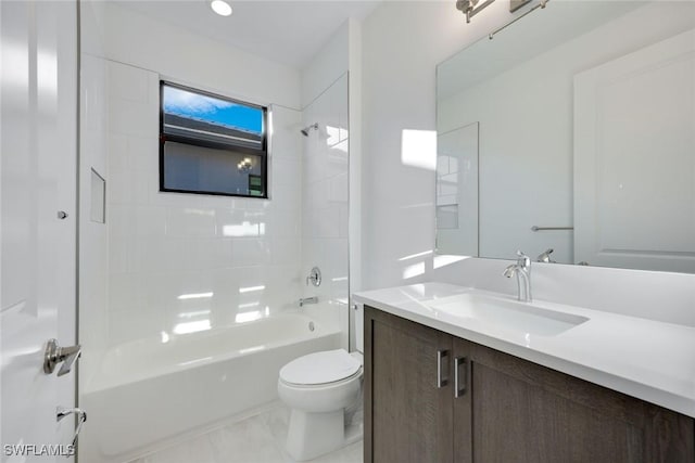 full bath featuring toilet, bathtub / shower combination, and vanity