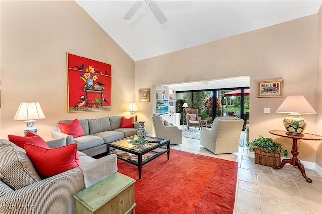 living area with high vaulted ceiling, baseboards, and a ceiling fan