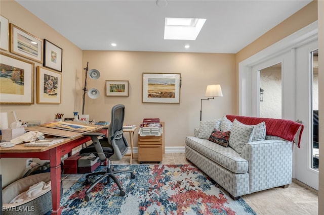 office with baseboards, a skylight, tile patterned flooring, and recessed lighting