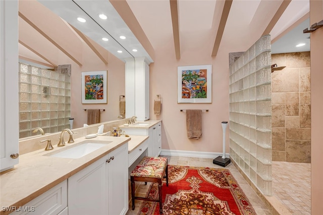 full bath featuring beam ceiling, walk in shower, vanity, and recessed lighting