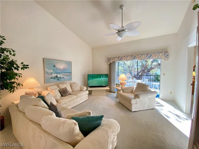 living area with a ceiling fan, baseboards, high vaulted ceiling, and carpet flooring