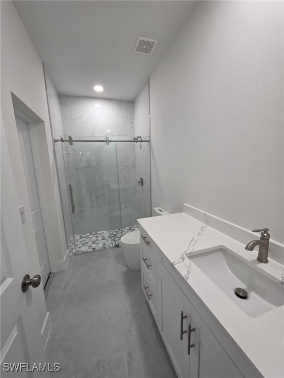 full bath with toilet, concrete floors, vanity, visible vents, and a marble finish shower