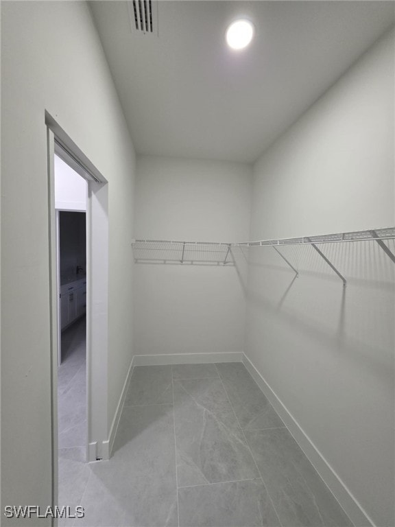 spacious closet with visible vents