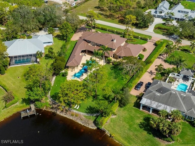 aerial view featuring a water view and a residential view