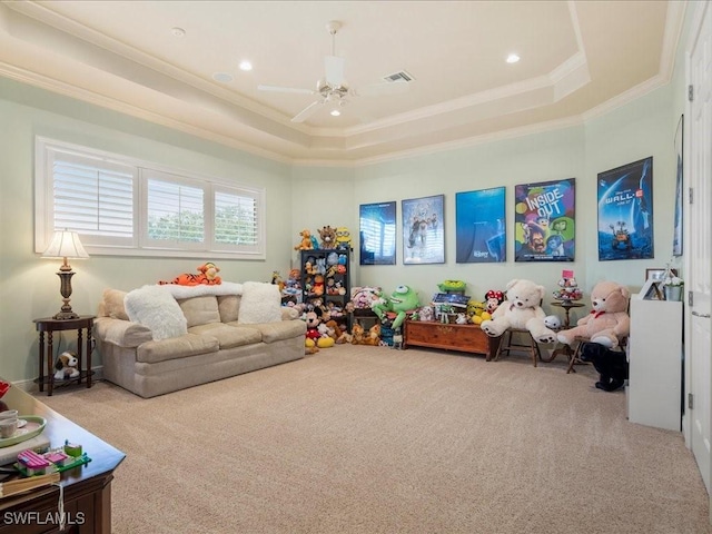 rec room featuring recessed lighting, light carpet, visible vents, a raised ceiling, and crown molding