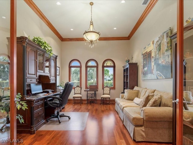 home office with ornamental molding, recessed lighting, baseboards, and wood finished floors