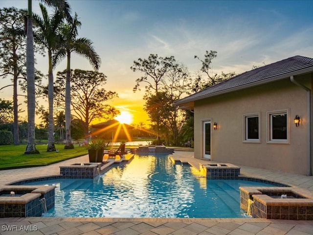 view of pool featuring a pool with connected hot tub