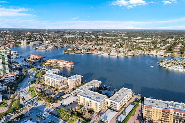 drone / aerial view with a view of city and a water view