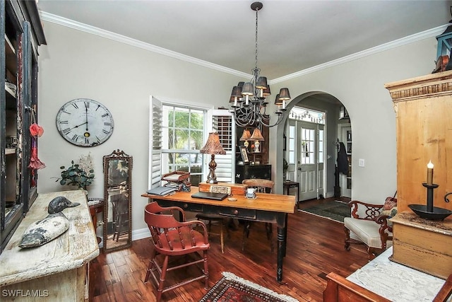 dining space featuring ornamental molding, arched walkways, dark wood finished floors, and baseboards