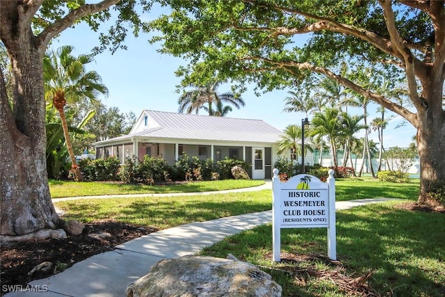 surrounding community featuring a lawn